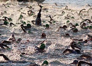 US Navy 051015-N-9419C-004 Almost 2,000 triathletes begin the 2.4-mile swim at the Ironman World Championship triathlon, held in Kailua-Kona, Hawaii