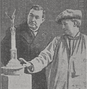 Margaret Winser with model of Hastings War Memorial.png