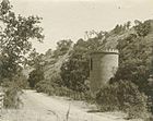 Old black and white photo of brick tower