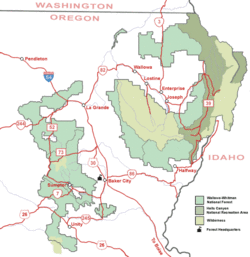 Baker City along I-84 in Oregon, surrounded by sections of Wallowa–Whitman National Forest.