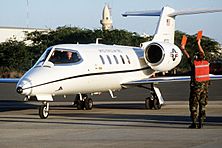 General Merrill McPeak flying a Learjet C-21A