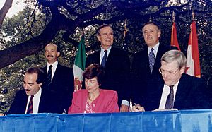 President Bush, Canadian Prime Minister Brian Mulroney and Mexican President Carlos Salinas participate in the... - NARA - 186460