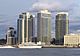 Two Northside Piers, a high-rise clad in gray-blue glass, viewed in the center from the East River