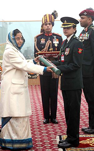 The President, Smt. Pratibha Devising Patil giving away the highest gallantry award Ashok Chakra to Major Rishima Sharma wife of the Major Mohit Sharma (posthumous) in New Delhi on January 26, 2010