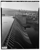 VIEW OF SPILLWAY DAM AND POWERHOUSE FOREGROUND, SHOWING NINE MILE RESERVOIR IN LEFT BACKGROUND, LOOKING WEST - Nine Mile Hydroelectric Development, Dam, State Highway 291 HAER WASH,32-NIMIFA.V,1A-3.tif