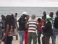 Crowd on Beach in Gabon