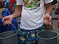 Man carrying two buckets