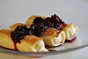 Cheese blintzes with blackberries