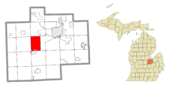 Location within Saginaw County (red) and an administered portion of the village of St. Charles (pink)