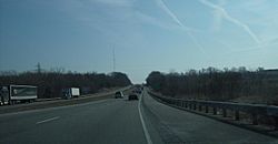 Interstate 76 passes through the wooded hills of Brimfield Township