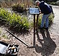 GT Tamping a new information signpost into place