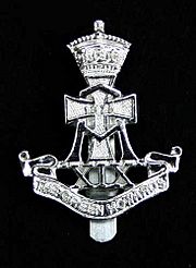 XIX-cap-badge.jpg