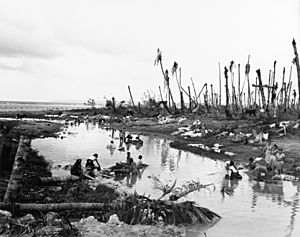 Women washing clothes in a river near Hagåtña on 12 August 1944