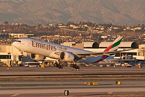 Emirates A6-EWA Boeing 777-200LR taking off from LAX (5222343985)