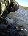 US Navy 030223-N-7479T-011 An AN-PQS-2A, a handheld sonar device used to aid in the search of the Toledo Bend Reservoir for debris from the Space Shuttle Columbia