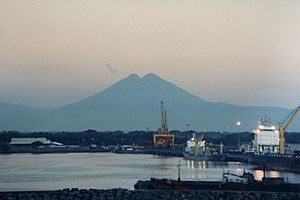 Puerto Quetzal seen at dawn, with the volcanoes on the horizon  Puerto Quetzal Cruise Port facilities