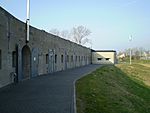 Wall with several metal gates