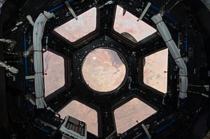 Cupola ISS open shutters