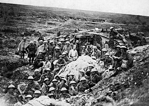 Troops with tank Flers-Courcelette 1916 IWM Q 5578