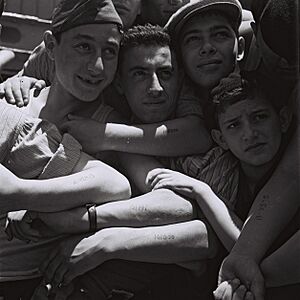 CHILDREN, HOLOCAUST SURVIVORS, ON BOARD THE REFUGEE SHIP "MATAROA" IN THE HAIFA PORT. ילדים, ניצולי שואה, מגיעים לנמל חיפה על גביי אונייה בריטית.D820-066