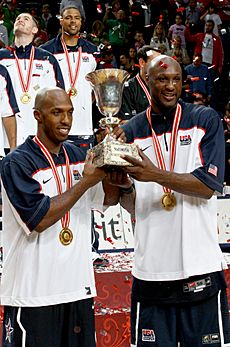 Billups & Odom holding World Cup trophy