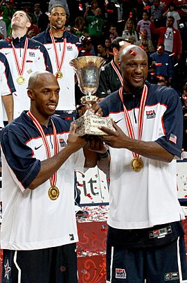 Billups & Odom holding World Cup trophy