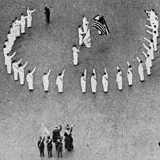 Bellamy salutes detail in 1917, from- Saluting the Flag NGM-v31-p361 (cropped)