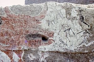 Mural from Çatalhöyük excavated by James Mellaart showing neolithic hunters attacking an aurochs (Bos primigenius).