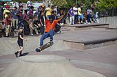 180 in an orange shirt at Far Rockaway Skatepark - 2019