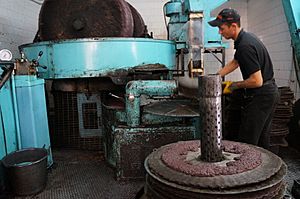 Olive paste being applied to fiber map