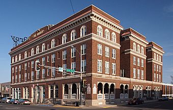 Four-story building occupying half a city block