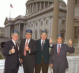 Senators Faircloth, Dole, Helms, and Thurmond show their enthusiasm for the Carolinas' new football team -- The Carolina Panthers