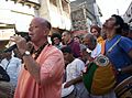 An American Guru distributing love of God among Indians and others in Dwarka, India