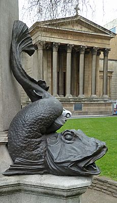 Fishy detail from the statue of Edward Colston, Bristol (7035605535)