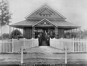 StateLibQld 1 109180 Town Councillors on the steps of the Isis Shire Hall, Childers, 1910