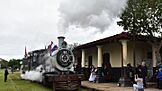 A train departing from the Ypacaraí train station