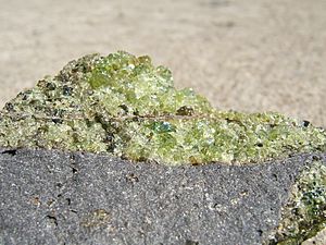 Peridot olivine on basalt