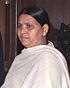 Rabri Devi presenting a cheque for Rs. 10 crore on behalf of the State Government to the Prime Minister, Dr. Manmohan Singh for the Prime Minister's National Relief Fund, in New Delhi on January 04, 2005 (cropped).jpg