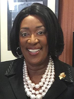 head shot of Arfican American woman with pearls