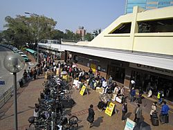 Parallel goods traders queuing outside SHS Exit C