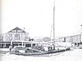 FMIB 34905 Small Sloop Used in Tonging Oysters Near Apalachicola, Fla, Returning with Load of Oysters, Showing Oyster Canneries in