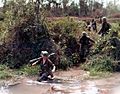 Wading Through Vietnam River