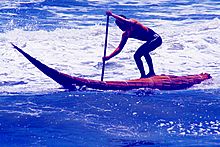 Surfing en caballito de totora en Huanchaco