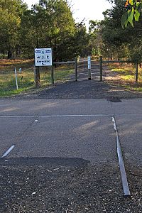 Tracks-across-Nicholson-Sarsfeild-Rd,-EG-Rail-Trail,-Nicholson,-VIC,-13.09.2008