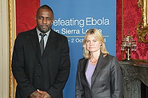 Idris Elba and Secretary of State Justine Greening arrive at the 'Defeating Ebola' conference