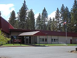 Keno entrance sign, elementary school in the background.