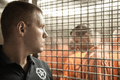 US Marshal guarding prisoners