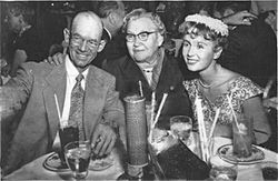 Press photo of R. F. Reynolds, O. Harman, and Debbie Reynolds in 1955 (front) - retouched