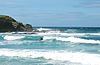 Solitary surfer at Treyarnon - geograph.org.uk - 1473756.jpg