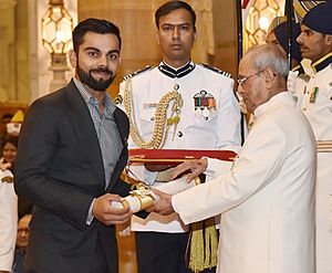 The President, Shri Pranab Mukherjee presenting the Padma Shri Award to Shri Virat Kohli, at a Civil Investiture Ceremony, at Rashtrapati Bhavan, in New Delhi on March 30, 2017